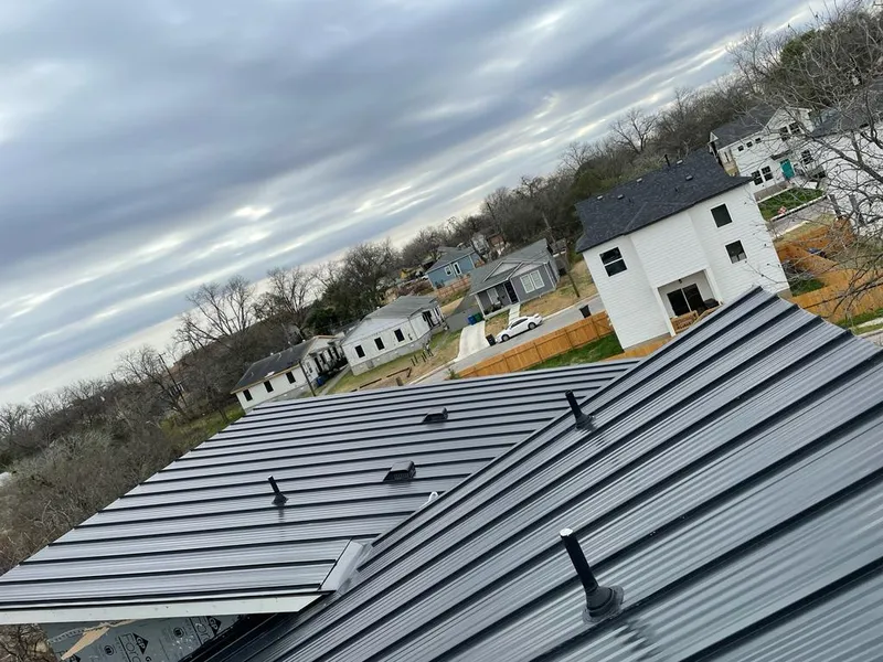 Standing seam metal roof panels with vents for Skylight Repair in Ontario